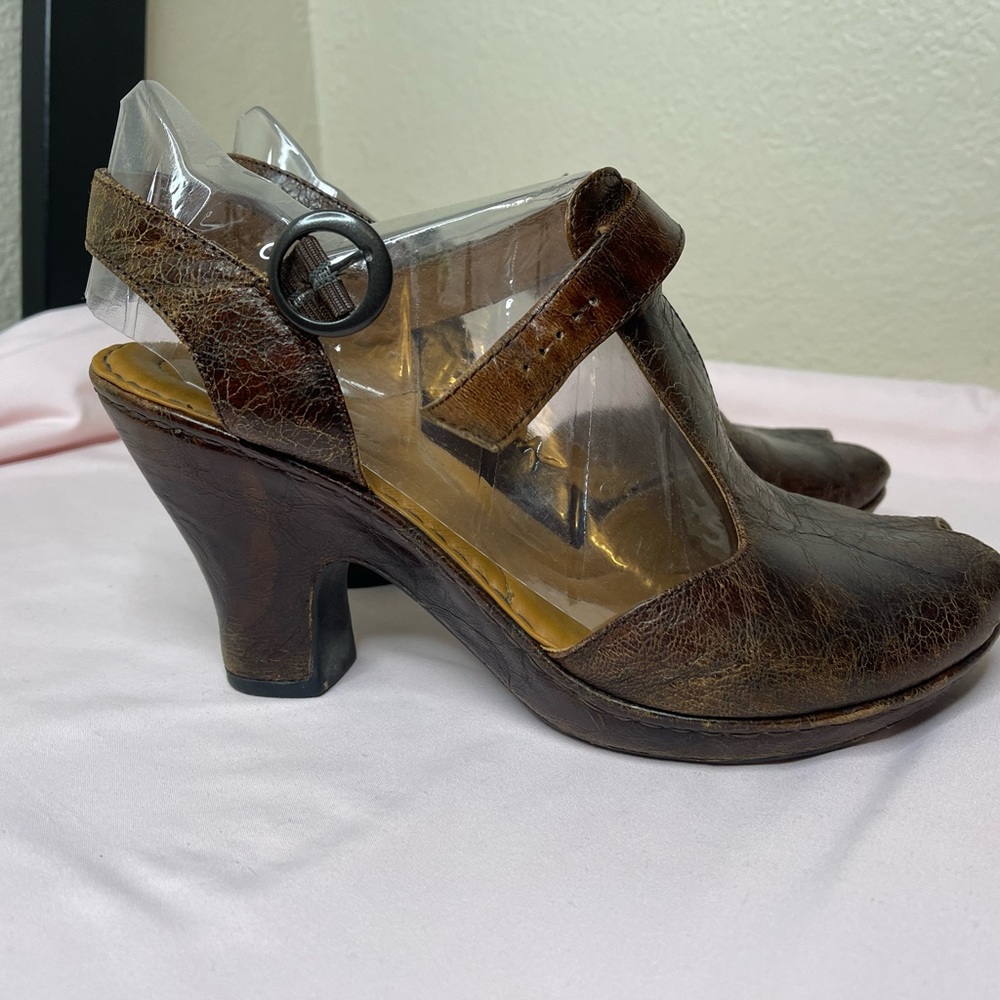 Born Crown Zola T strap peep toe shoes.